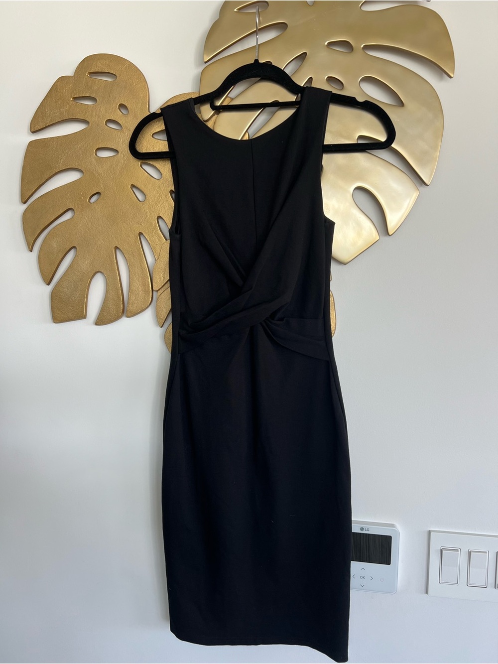 Classic Black Sleeveless Twist-Front Sheath Dress